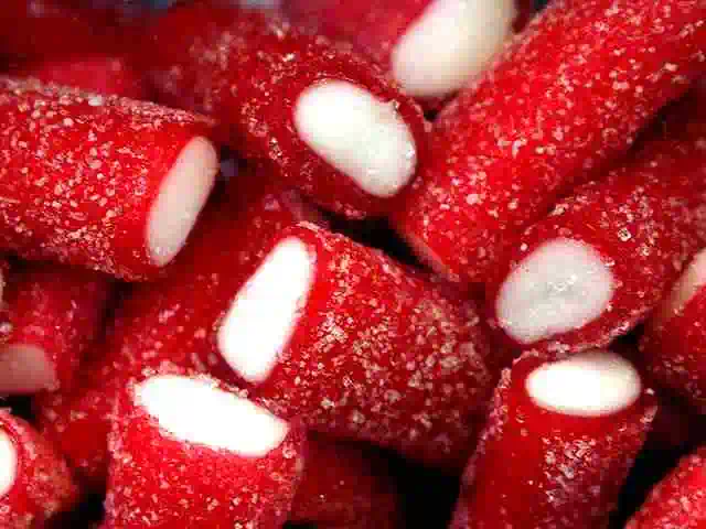 extreme close up of red sugared candies